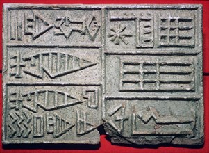 Akkadian inscription on a brick-stamp of baked clay. Artist: Unknown