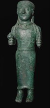Greek bronze figure holding a pomegranate. Artist: Unknown