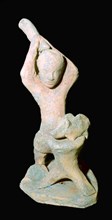 Greek terracotta statuette of a butcher with a pig. Artist: Unknown