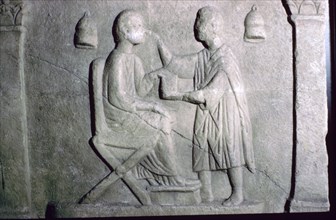 Roman relief of an oculist at work. Artist: Unknown