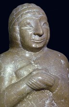 Detail of a limestone statue of a woman, about 2500 BC, from Tello (ancient Girsu),Southern Iraq. Artist: Unknown