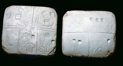 Early Sumerian stone tables, inscribed with very early archaic pictographic symbols. Artist: Unknown