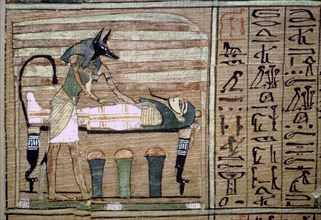 Papyrus of Anubis preparing a mummy. Artist: Unknown