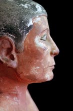Close up of an Egyptian seated scribe model. Artist: Unknown