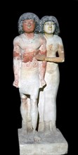 Egyptian sculpture of a man and his wife. Artist: Unknown