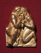 Scythian plaque showing two men drinking from a horn, 4th century BC Artist: Unknown