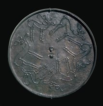 Back of an early Russian bronze mirror. Artist: Unknown
