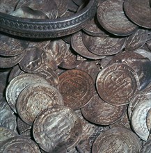 Hoard of silver with arab coins from a Viking grave. Artist: Unknown