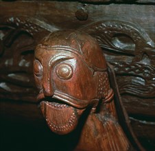 Carved head detail from a cart in the Oseburg Viking ship burial, 9th century. Artist: Unknown