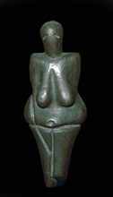 Paleolithic female figure of baked clay. Artist: Unknown