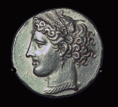 Head of Tanit on a gold tridrachm. Artist: Unknown