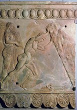 Roman terracotta Campana plaque showing Theseus lifting a huge rock. Artist: Unknown