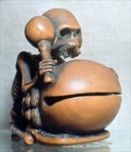 Japanese Netsuke of a skeleton playing a drum, 18th century. Artist: Unknown