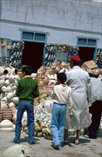 Pottery shop in Kairouan in Tunisia. Artist: Unknown