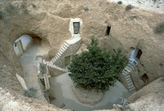 Pit-dwelling in Tunisia. Artist: Unknown