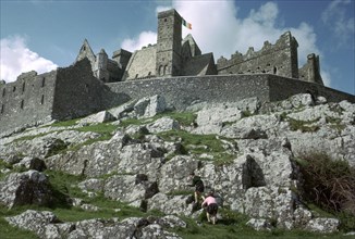 St Patrick's rock and the old cathedral in Cashel. Artist: CM Dixon Artist: Unknown
