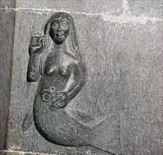 Mermaid on the chancel arch of Clonfert Cathedral, 12th century. Artist: Unknown