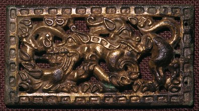 Chinese bronze belt-buckle with animals in combat, 5th century BC. Artist: Unknown