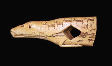 Ivory arrow straightener in the form of a bear with engraved pictographs. Artist: Unknown