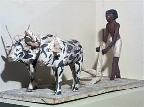 Wooden model of a man ploughing with oxen, from Egypt, Middle Kingdom, c2040-1750 BC. Artist: Unknown