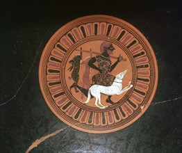 Detail of a Greek kylix showing a hunter and his dog. Artist: Unknown