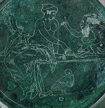 Close-up of a Greek bronze mirror-back. Artist: Unknown