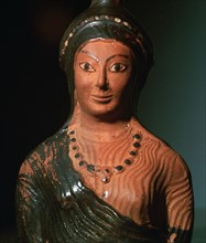 Greek terracotta scent bottle in the shape of a female bust. Artist: Unknown