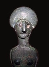 Detail of a Celtic-Iberian style bronze female figurine. Artist: Unknown