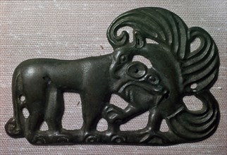 Chinese bronze harness plaque of a tiger and gryphon, 2nd century BC. Artist: Unknown