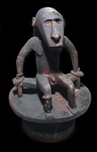 Wooden figure of a sea spirit, with head in the form of a shark, from the Solomon Islands. Artist: Unknown
