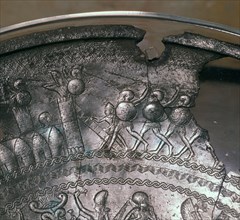 Detail of a Phoenician silver bowl showing soldiers attacking a city, 7th century BC. Artist: Unknown