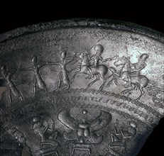 Detail of a Phoenician silver bowl showing soldiers attacking a city, 7th century BC. Artist: Unknown
