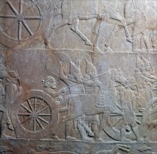 Assyrian relief showing Assyrian chariot at battle of the river Ulai, 7th century. Artist: Unknown