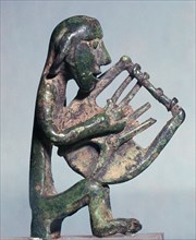 Minoan bronze of a harpist Artist: Unknown