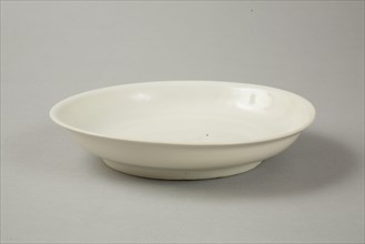 White dish with anhua design of two phoenix and cloud scroll design, Song dynasty, c.1300. Artist: Unknown.
