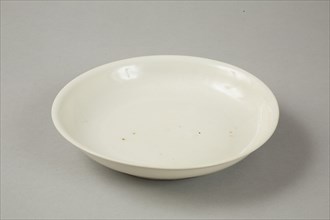 White dish with anhua design of two phoenix and cloud scroll design, Song dynasty, c.1300. Artist: Unknown.