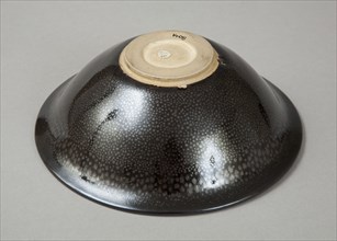 A 20th century copy of buff-bodied Cizhou-type bowl with oil spot glaze, 20th century. Artist: Unknown.