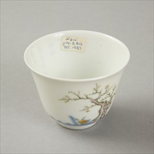 Underglaze blue month cup with polychrome enamelled decoration of a prunus tree. Artist: Unknown.