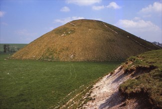 Silbury Hill, Wiltshire from the West, 20th century. Artist: CM Dixon.