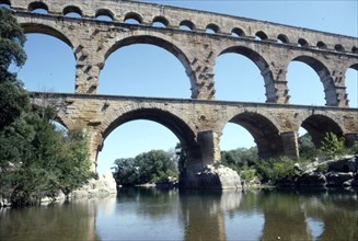 Roman aqueduct in Pont du Gard, France, 1st century. Artist: CM Dixon.