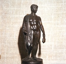 Mercury holding a purse, carrying a traveller's cloak. Roman brronze, 1st century. Artist: Unknown.