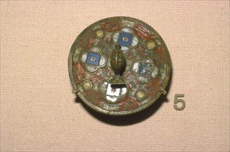 Enamelled bronze Brooch with stylised Dolphin in centre, 2nd-3rd century.  Artist: Unknown.