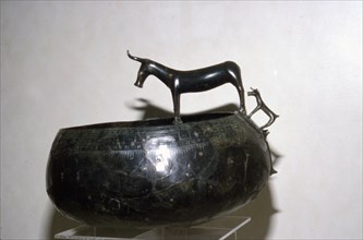 Celtic Bronze Bowl with Cow and Calf from Halstatt, Austria. Celtic Iron Age., c.6th-8th century BC Artist: Unknown.