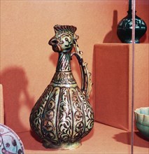 Persian (Kashan) Ewer with cockerel's head and tail handle,  early 13th century Artist: Unknown.