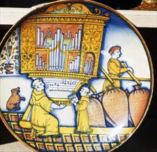 Monks and Organ with Sheet Music, Earthenware Italian Dish, c1515.  Artist: Unknown.