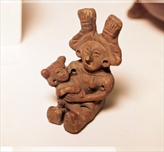 Pottery Rattle of woman holding child, Mexico. Axtec, late Post-Classic Period, 1300-1520. Artist: Unknown.