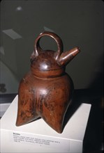 Pottery vessel with twin spouts (one missing) and strap-handle, Quimbaya, Columbia, 500-1000. Artist: Unknown.