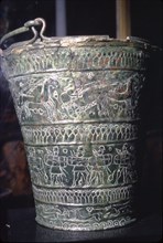 Bronze Situla with incised decoration showing warriors, Etruscan, Bologna, c6th century BC. Artist: Unknown.