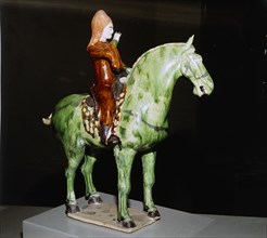 Chinese Tomb Figure of Horse and Rider, Tang Period, 8th century. Artist: Unknown.
