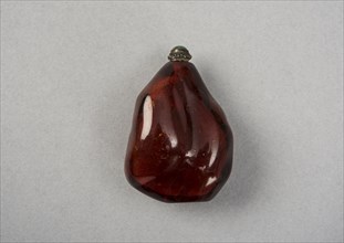 Amber snuff bottle of natural pebble form, China, Qing dynasty, 1644-1911. Creator: Unknown.